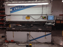 Enu550T cnc control retrofitted onto Wysong THS press brake. Wysong THS press brake retrofitted with CNC backgauge upgrade and EnuLASER Guard.